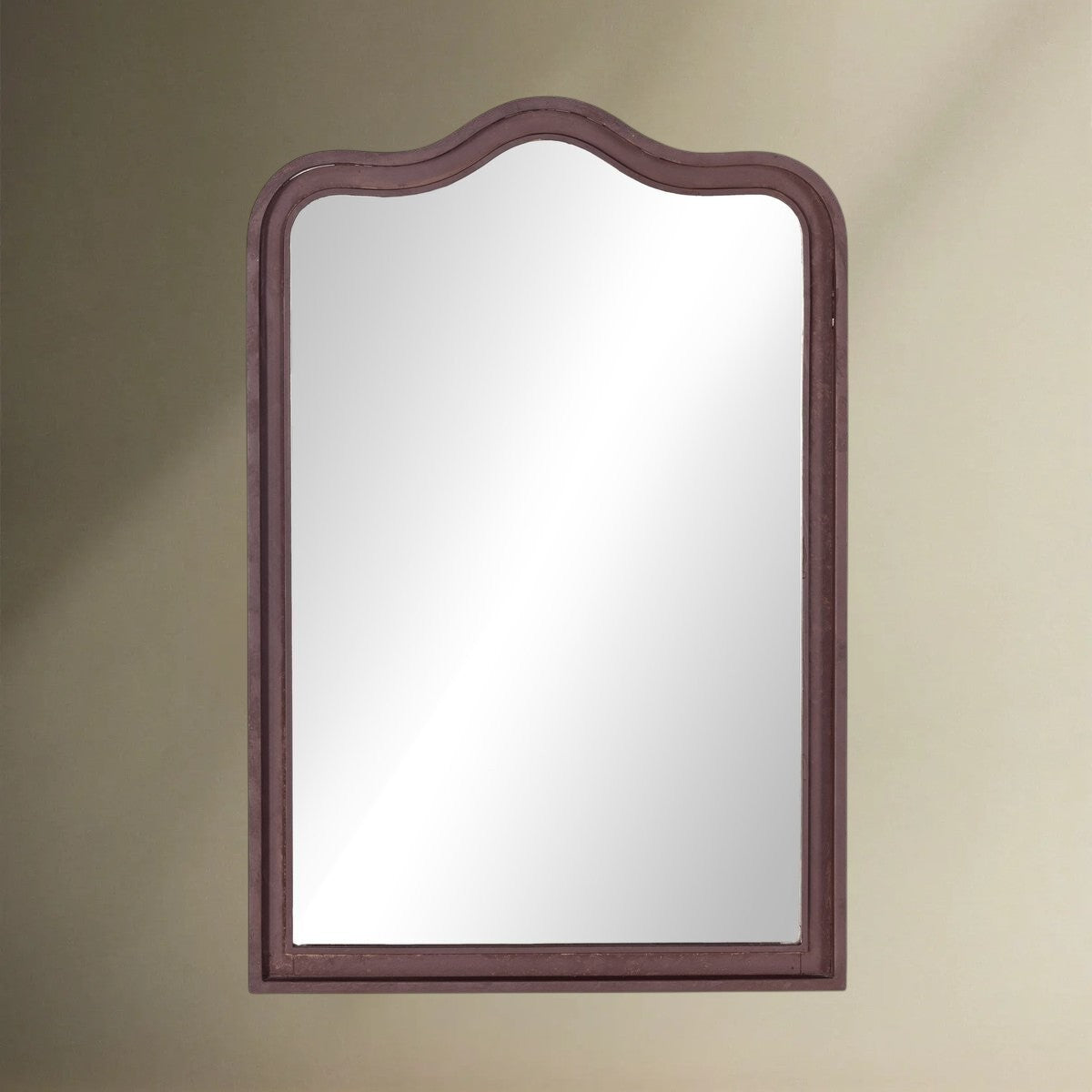 Raw antique iron framed mirror in a classic shape.