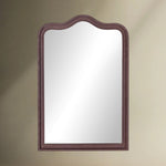 Raw antique iron framed mirror in a classic shape.